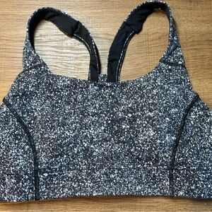 Great condition Lululemon bra in black and white with removable pads